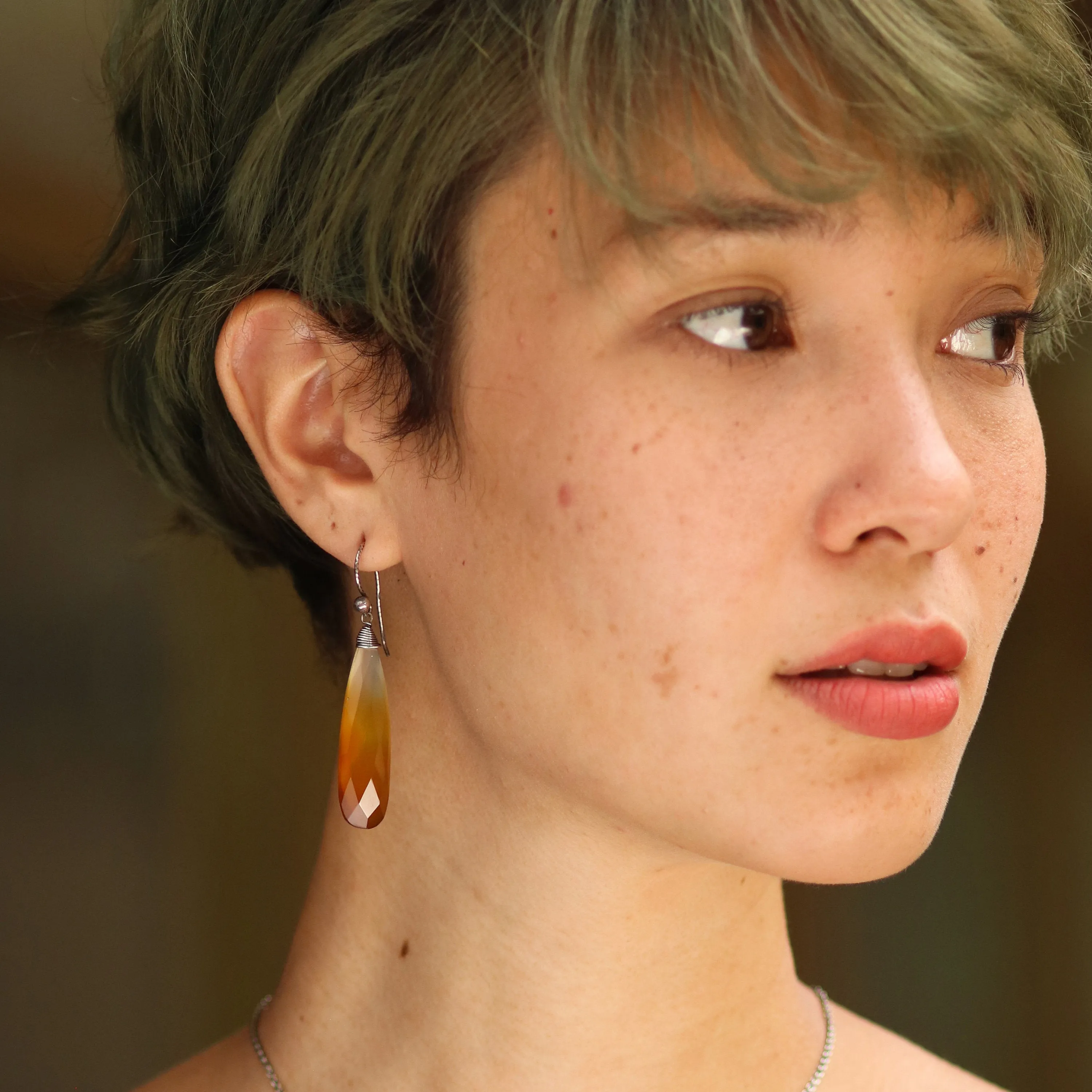 Yellow dyed chalcedony teardrop faceted earrings with silver wire wrapped on oxidized sterling silver hooks style